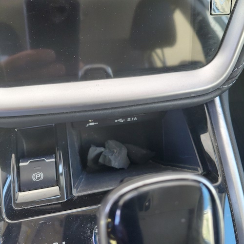 Place shungite in car console.